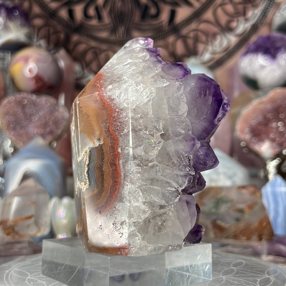 Juicy amethyst tower with calcite inclusions