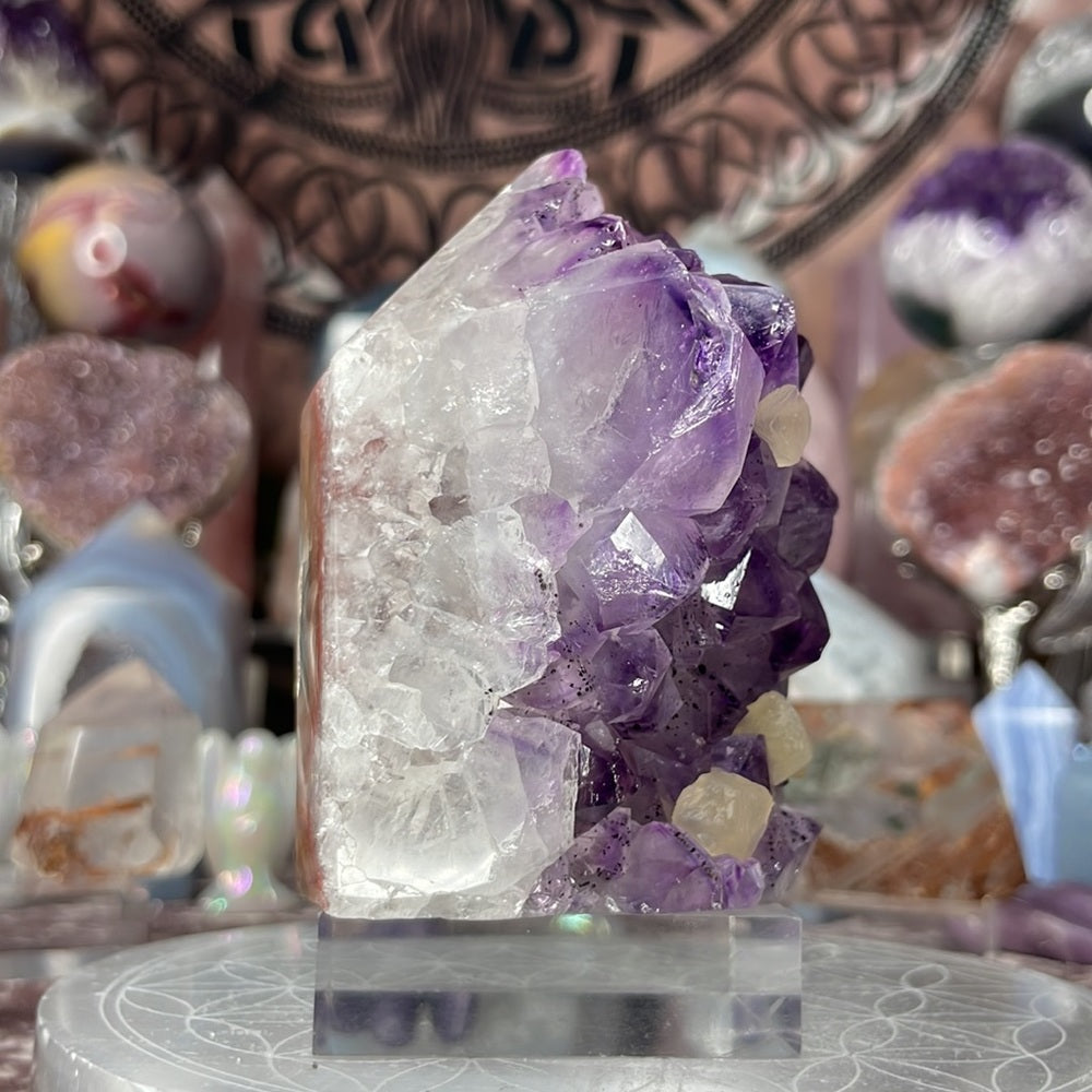 Juicy amethyst tower with calcite inclusions